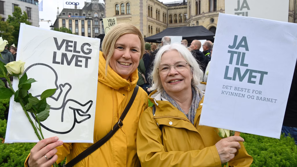 Ragnhild Helena Aadland Høen, public affairs officer for the Norwegian Catholic Bishops’ Conference, stands with Maria Fongen, family pastoral adviser for the Catholic Diocese of Oslo, with the Norwegian Parliament (Stortinget) in the background for the first March for Life after 40 years in Norway.