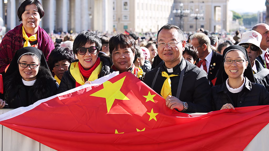 Chinese Pilgrims celebrate Chinese Martyrs in Rome. Holding the flag.
