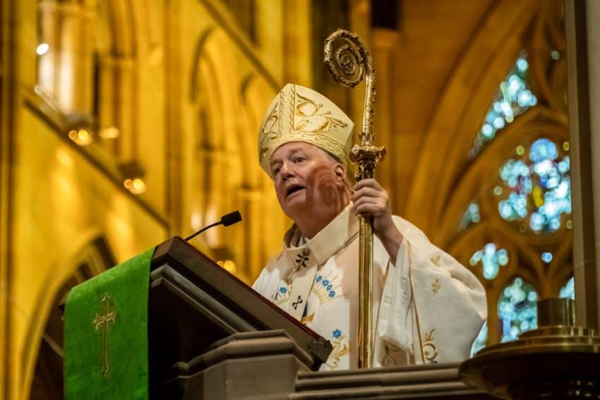 Archbishop Fisher speaks from the pulpit at St Mary's Cathedral, Sydney, in full episcopal vestments.