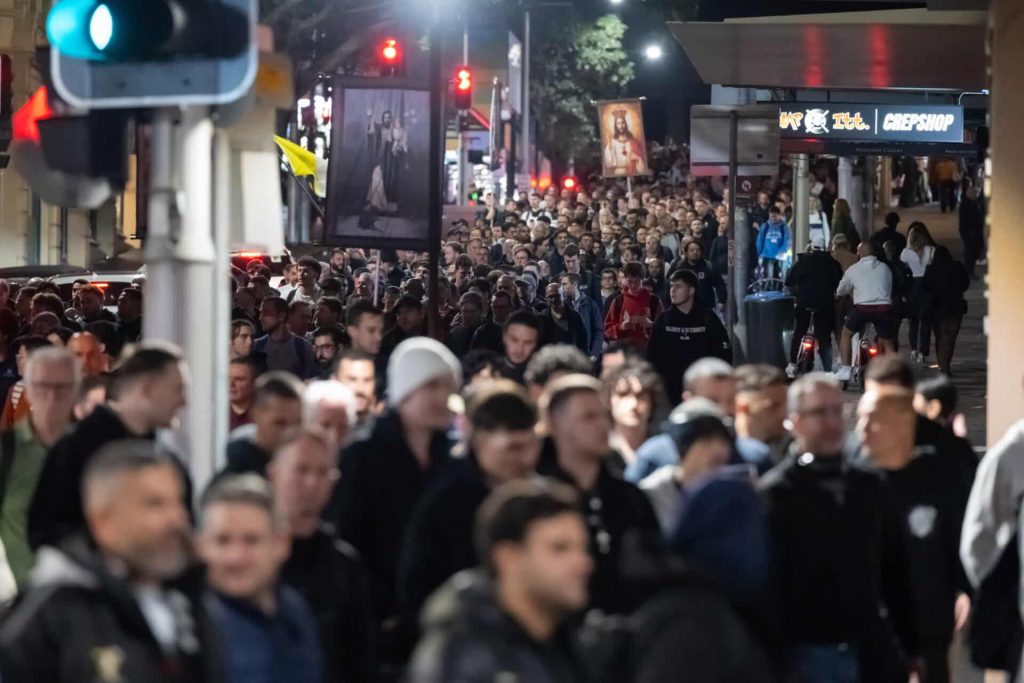 More than 1,500 men walk through the streets of Sydney during the Camino of St Joseph overnight pilgrimage.