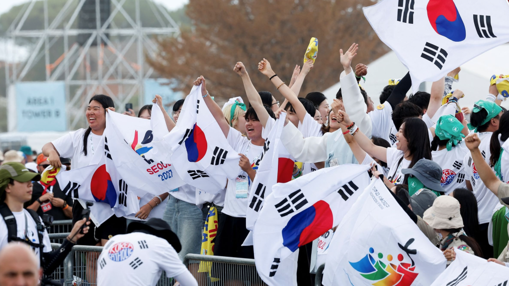Korean pilgrims wave flags as World Youth Day 2027 Seoul is confirmed for 3–8 August.