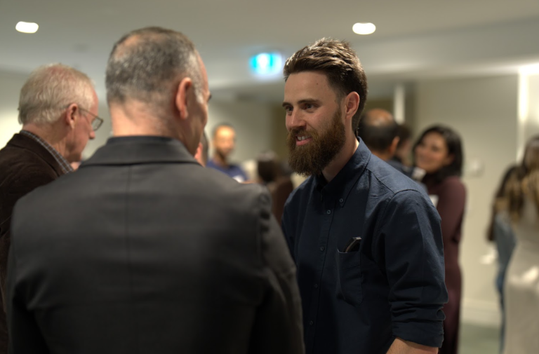 John Pridmore speaking with attendees at a Mary’s Meals event in Melbourne